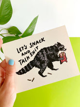 Let’s Snack and Talk Sh*t Raccoon Greeting Card